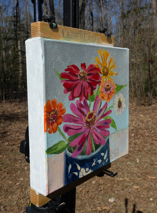 Zinnias in a Blue Mug by Mary Beatty-Brooks |  Side View of Artwork 