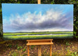 Original art for sale at UGallery.com | Horizon Marsh Clouds II by Nancy Hughes Miller | $2,800 | oil painting | 24' h x 48' w | thumbnail 3