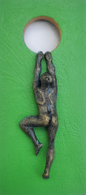 mixed media artwork by Yelitza Diaz titled Climber on Green Hanging on the Moon.